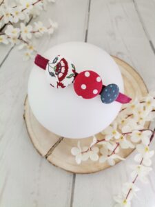 Аксесоар за коса с копчета